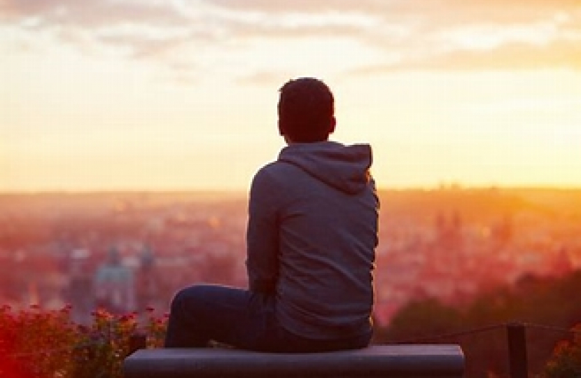 A young person looking to the horizon