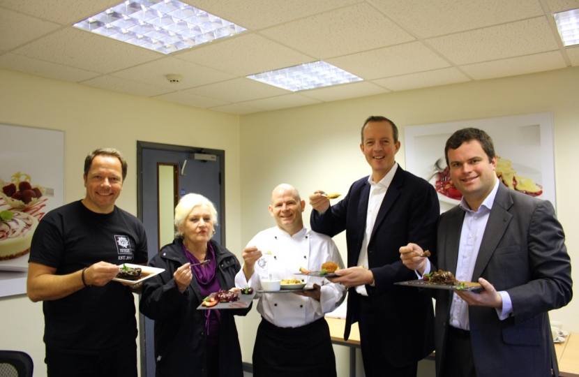 Nick Boles tries the 1,000,001st pudding.