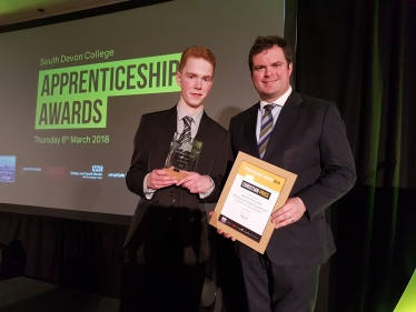 Kevin Presents Christian Price with the Apprentice of The Year Award.