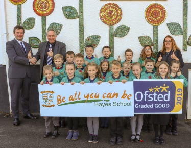 Kevin With Children and Staff at Hayes Primary