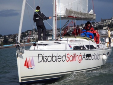 A leading figure in the Disabled Sailing Association has been honoured.