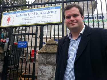 Kevin outside Ilsham Academy that has partnered with Ellacombe Academy