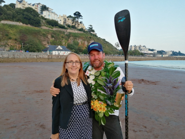 Cllr Hazel Foster welcoming Brendon Prince back to Torquay at the end of his epic journey