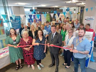 Kevin Foster MP cuts the ribbon to open the new community hub.